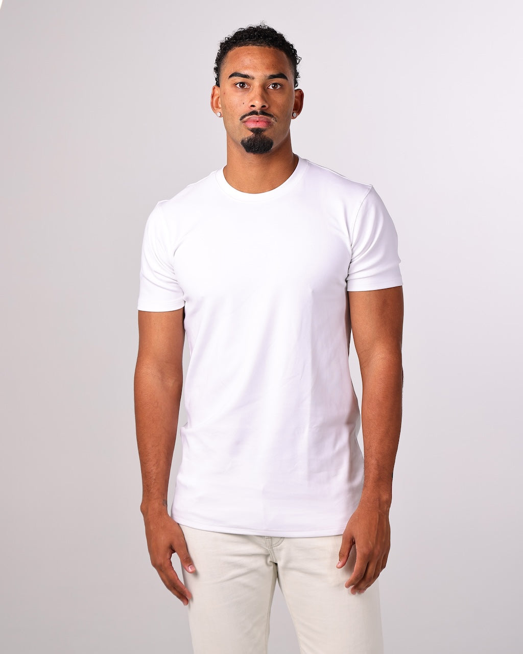 Pure white long torso men’s t-shirt by Tall Daddy with extended length for tall men without sizing up